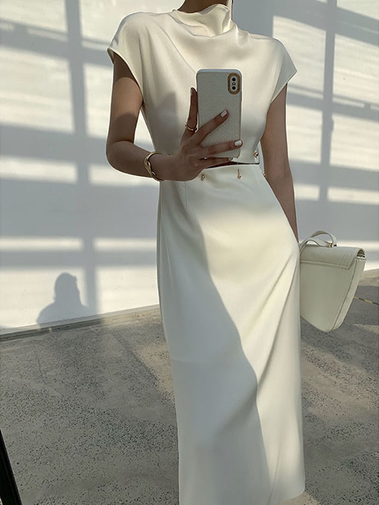 TWOTWINSTYLE-Elegant-White-Long-Dress-Female-Round-Neck-Short-Sleeve-High-Waist-Cut-Out-Midi-Dresses-1.jpg